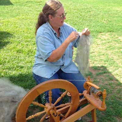 Celia Petersen spinning fleece