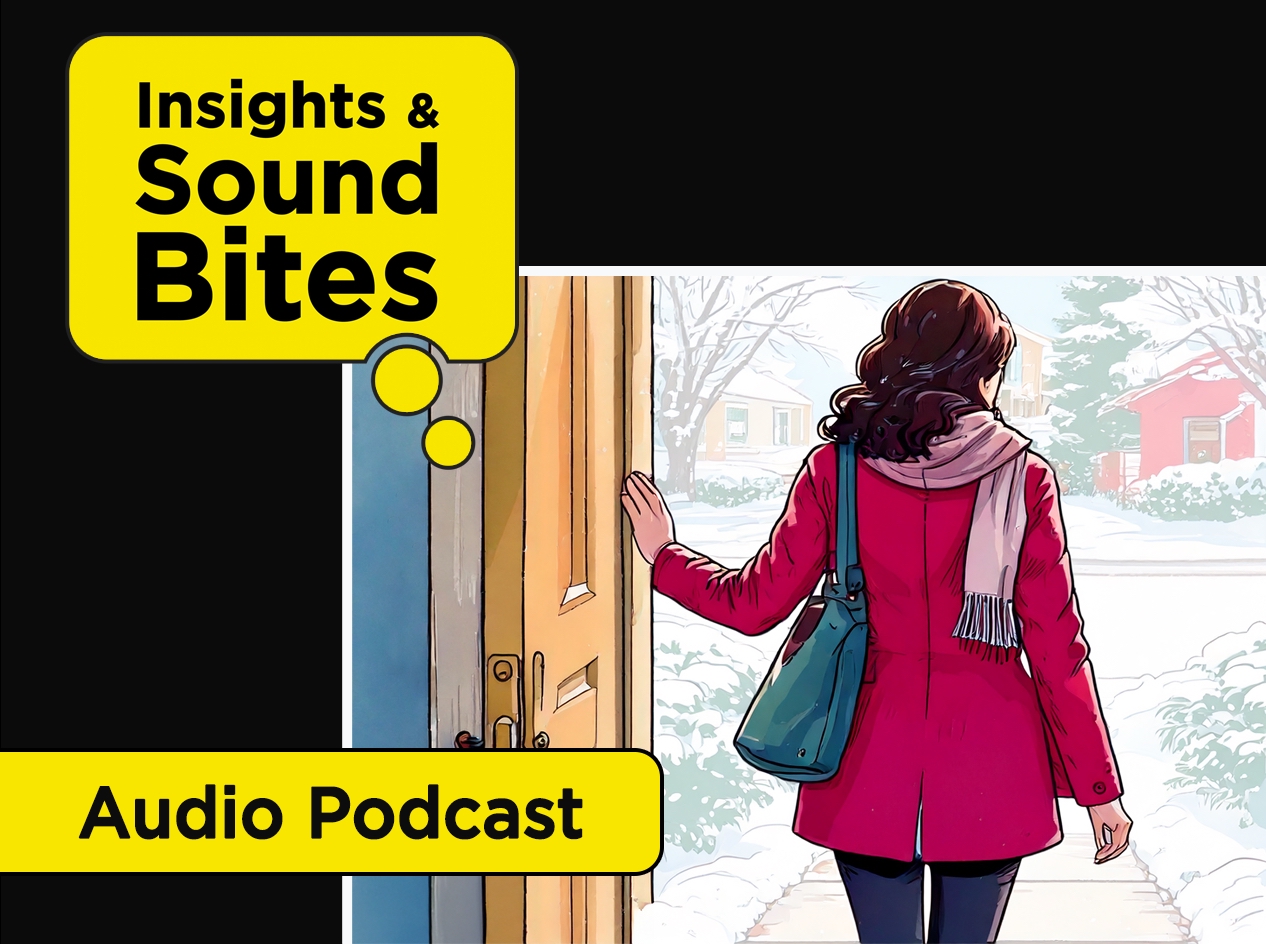 Woman pausing in open front doorway with left hand on doorframe, dressed for the cold in coat and scarf, before heading out into bright winter day.