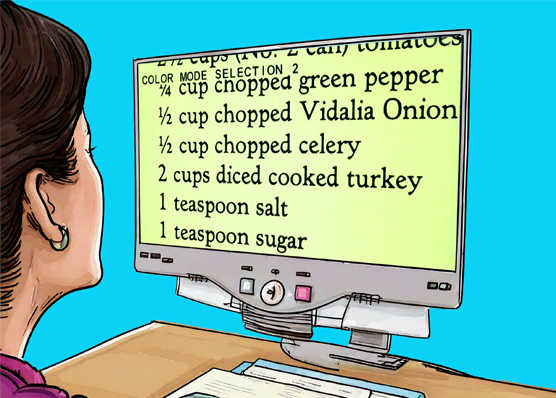 Woman looking at desktop magnifier that has recipe ingredients highly magnified in black text on a yellow background.