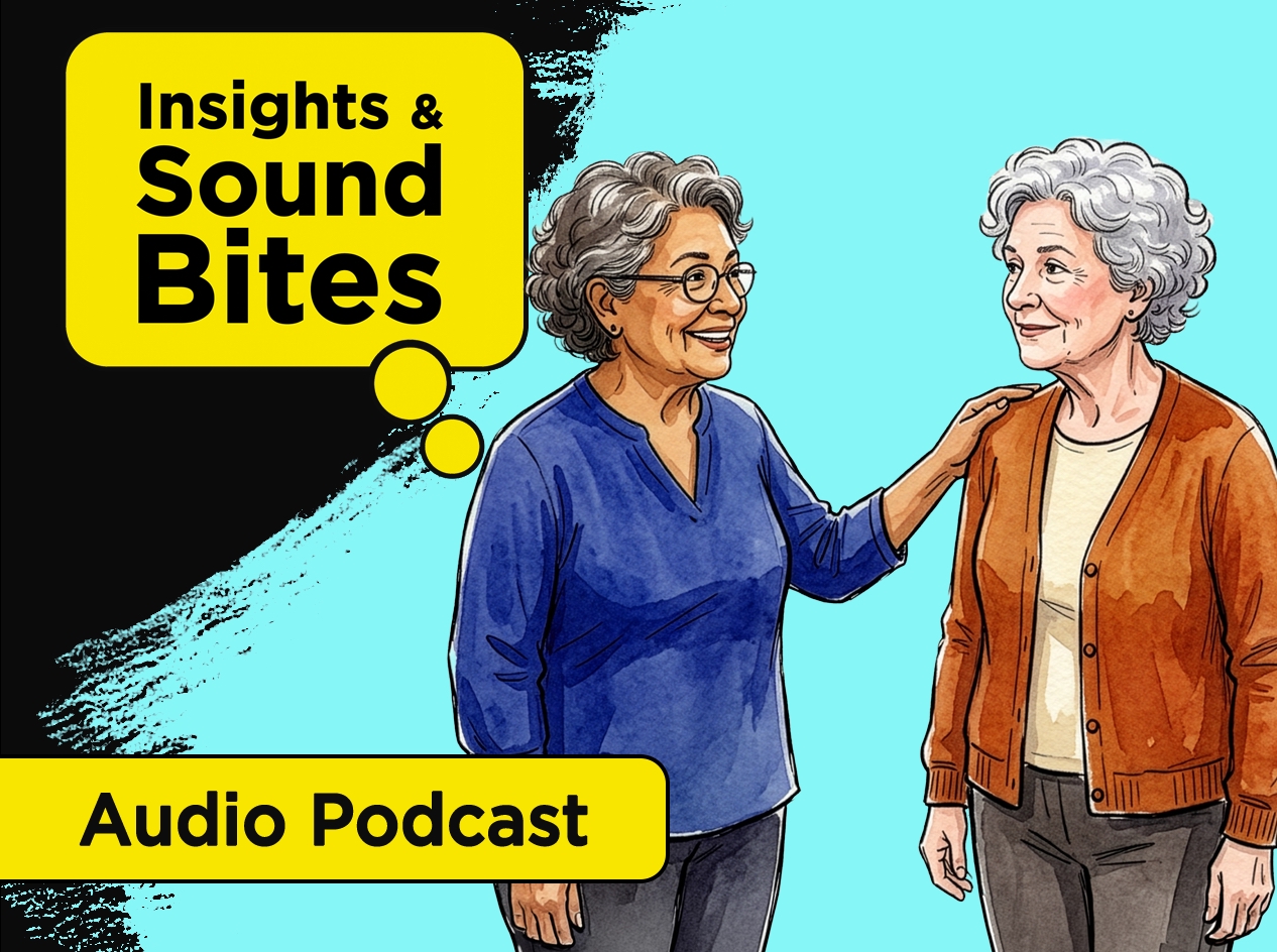 Two older women in conversation with one woman's hand on the other's shoulder.